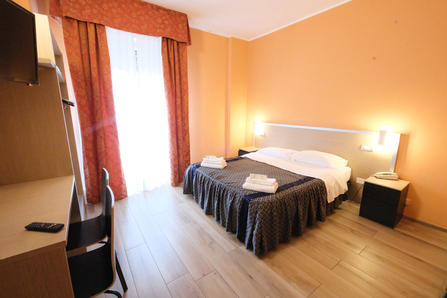 Facade or room of Hotel Lugano